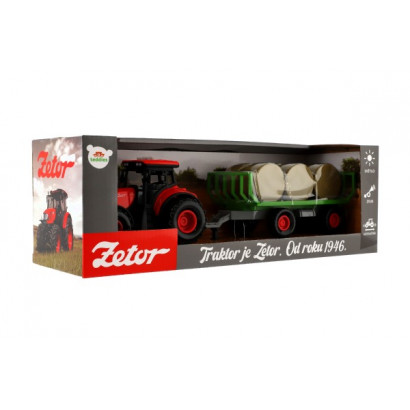 Traktor Zetor s vlekom a balíkmi plast 36cm na zotrvačník na bat. so svetlom so zvukom v krab. 39x13